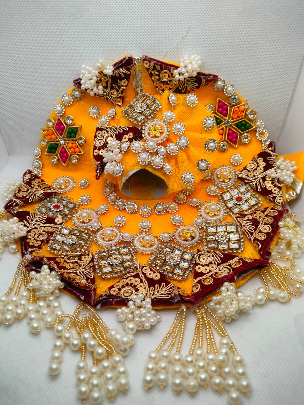 Pushpraag Rang Poshak (पुष्पराग रंग पोशाक)